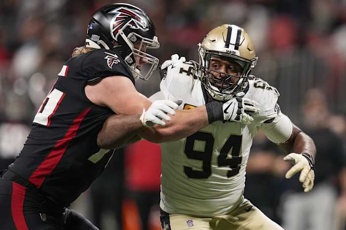 Jan 9, 2022; New Orleans Saints defensive end Cameron Jordan (94) rushes the passer against Atlanta Falcons offensive tackle Kaleb McGary (76). Mandatory Credit: Dale Zanine-USA TODAY Sports